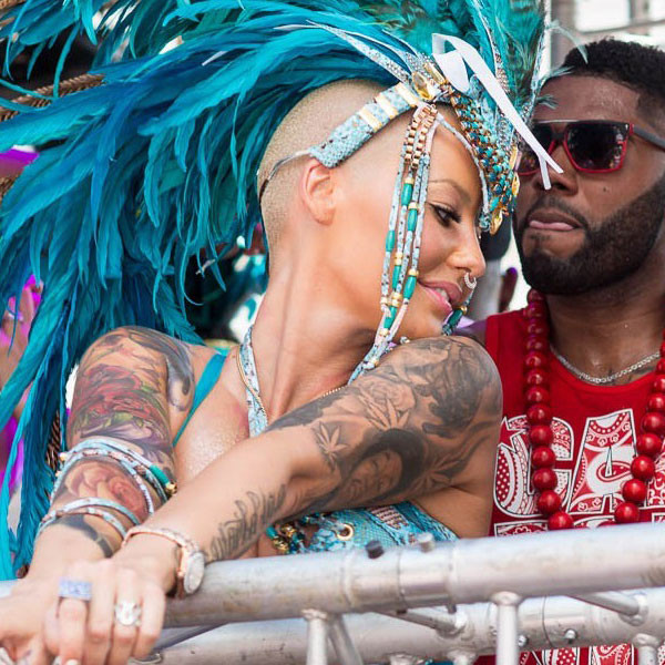 Watch a Nearly Naked Amber Rose Grind Her Butt on a Guy at Carnival