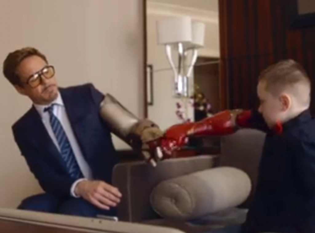 Robert Downey Jr. Presents Iron Man Bionic Arm to 7YearOld Boy—Watch