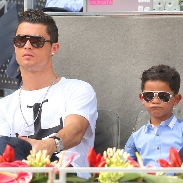Watch Cristiano Ronaldo Adorably Teach His Son How to Do Crunches - E