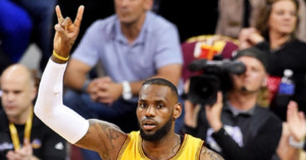 LeBron James cuts head falling head-first into crowd at 