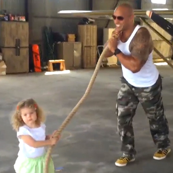 Dwayne Johnson Lets 2-Year-Old Girl Believe She's Pulling a Plane and It's the Cutest Thing Ever - T-News