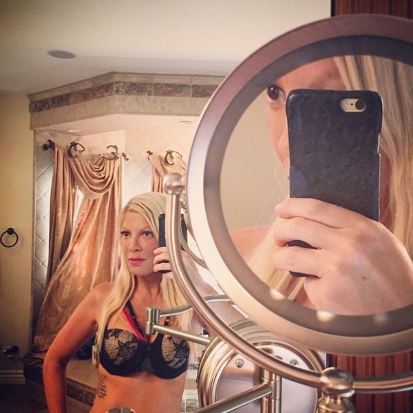 Tori Spelling Wears Just a Bra in Sexy Selfie