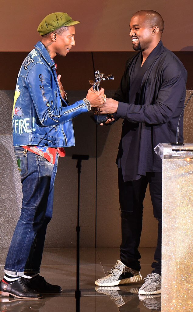 Kanye West Surprises Pharrell Williams by Presenting Him With the ...