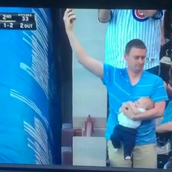 Dad's insane catch while carrying baby, Baseball