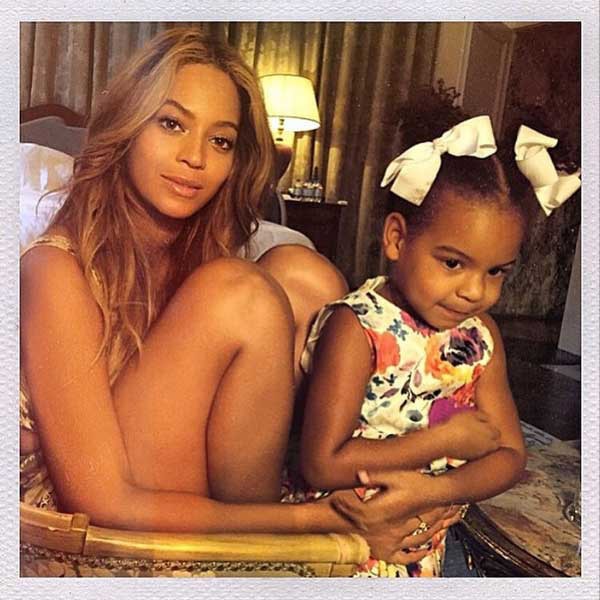 Beyoncé Cuddles With Daughter Blue Ivy, Jay Z Smiles and Plays With ...