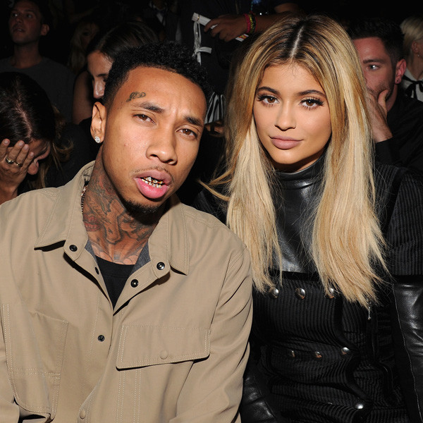 Kylie Jenner & Tyga Coordinate Their Black Outfits at LAX Airport