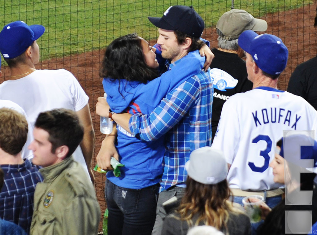 Mila Kunis wears pretty camisole as she catches a Dodgers game with fiance  Ashton Kutcher