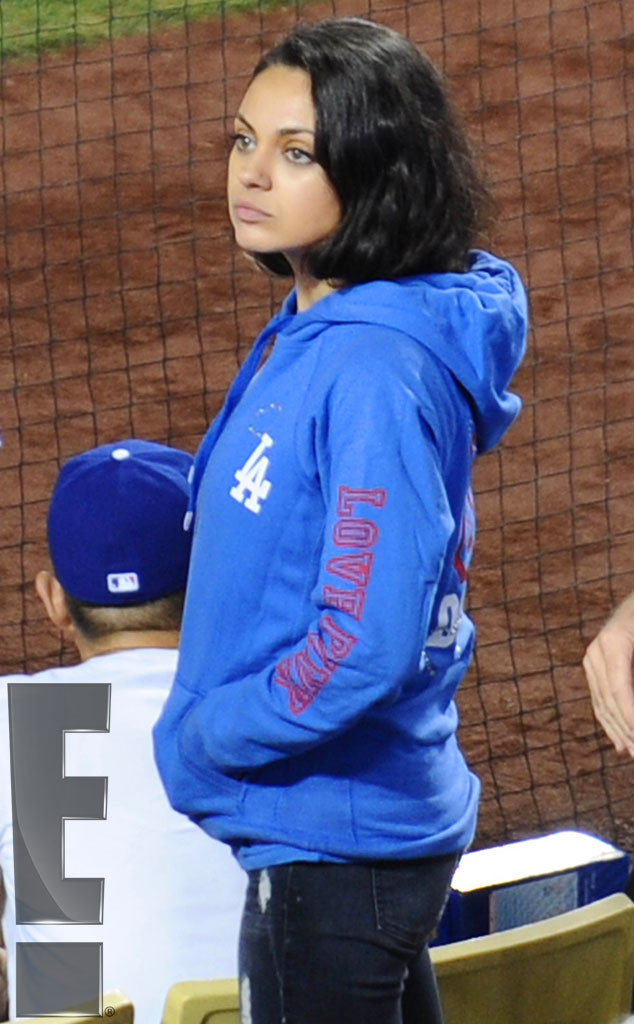 Mila Kunis wears pretty camisole as she catches a Dodgers game with fiance  Ashton Kutcher