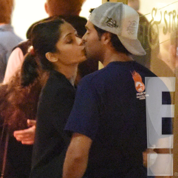 Freida Pinto Kisses New Man Ronnie Bacardi See The Pda Pics E Online