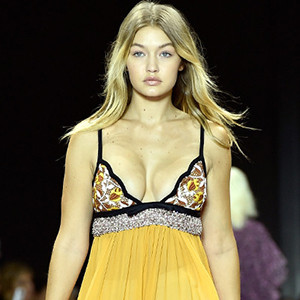 Gigi Hadid Flaunts Curves in Sexy Plunging Gown at Giambattista Valli