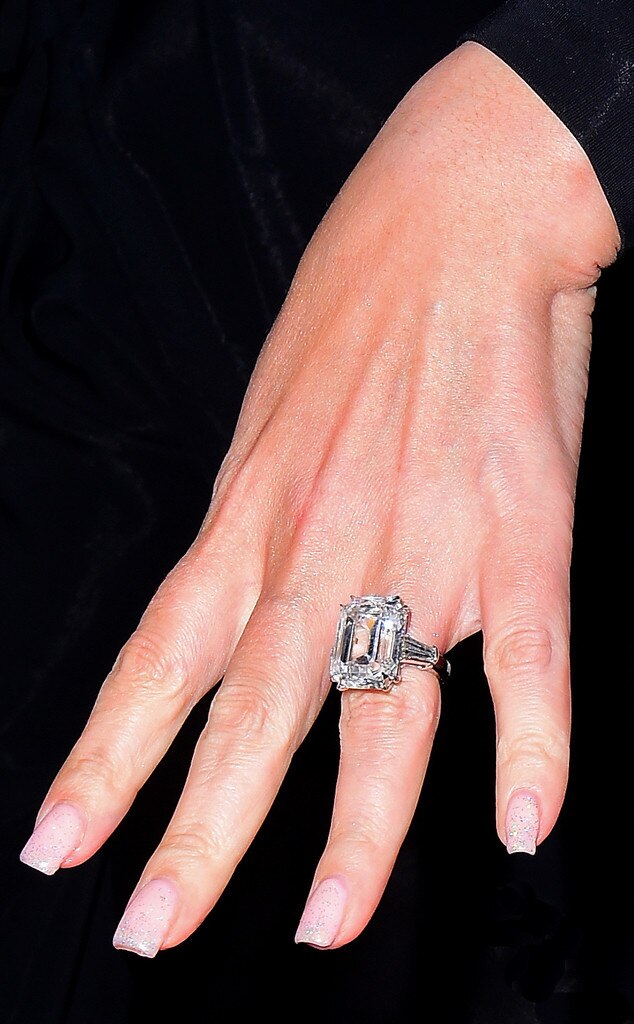 Golden Globes 2024: Margot Robbie flashes a huge diamond ring on her  engagement finger after receiving a very modest rock from husband Tom  Ackerely | Daily Mail Online