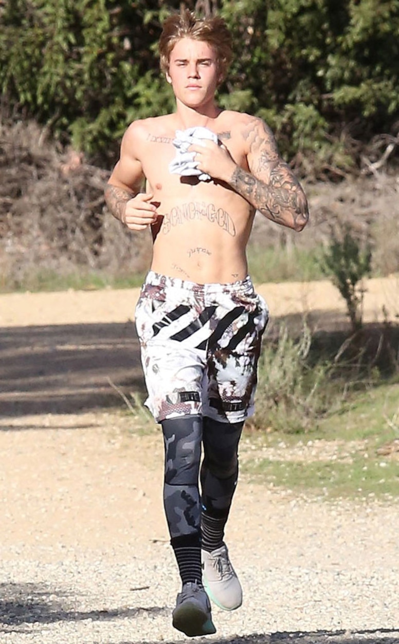 Photos from Justin Bieber's Many Tattoos - E! Online