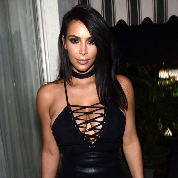 Kim Kardashian appears to be wearing butt pads with sheer skirt