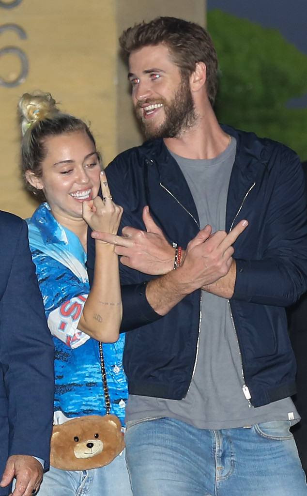 Miley Cyrus And Liam Hemsworth Make Obscene Gestures After Date