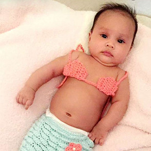 Chrissy Teigen & John Legend's Daughter Luna Is a Cute Baby Mermaid E