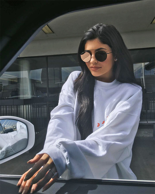 Kylie Jenner appears exhausted as she flashes THAT promise ring