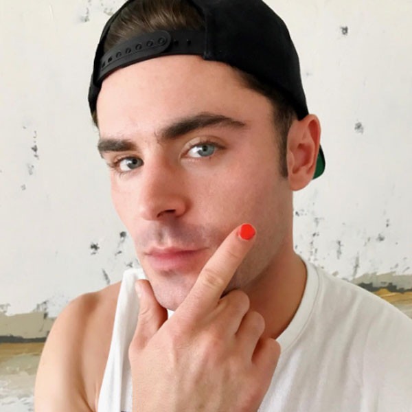 Why Zac Efron Is Sporting Red Nail Polish E News