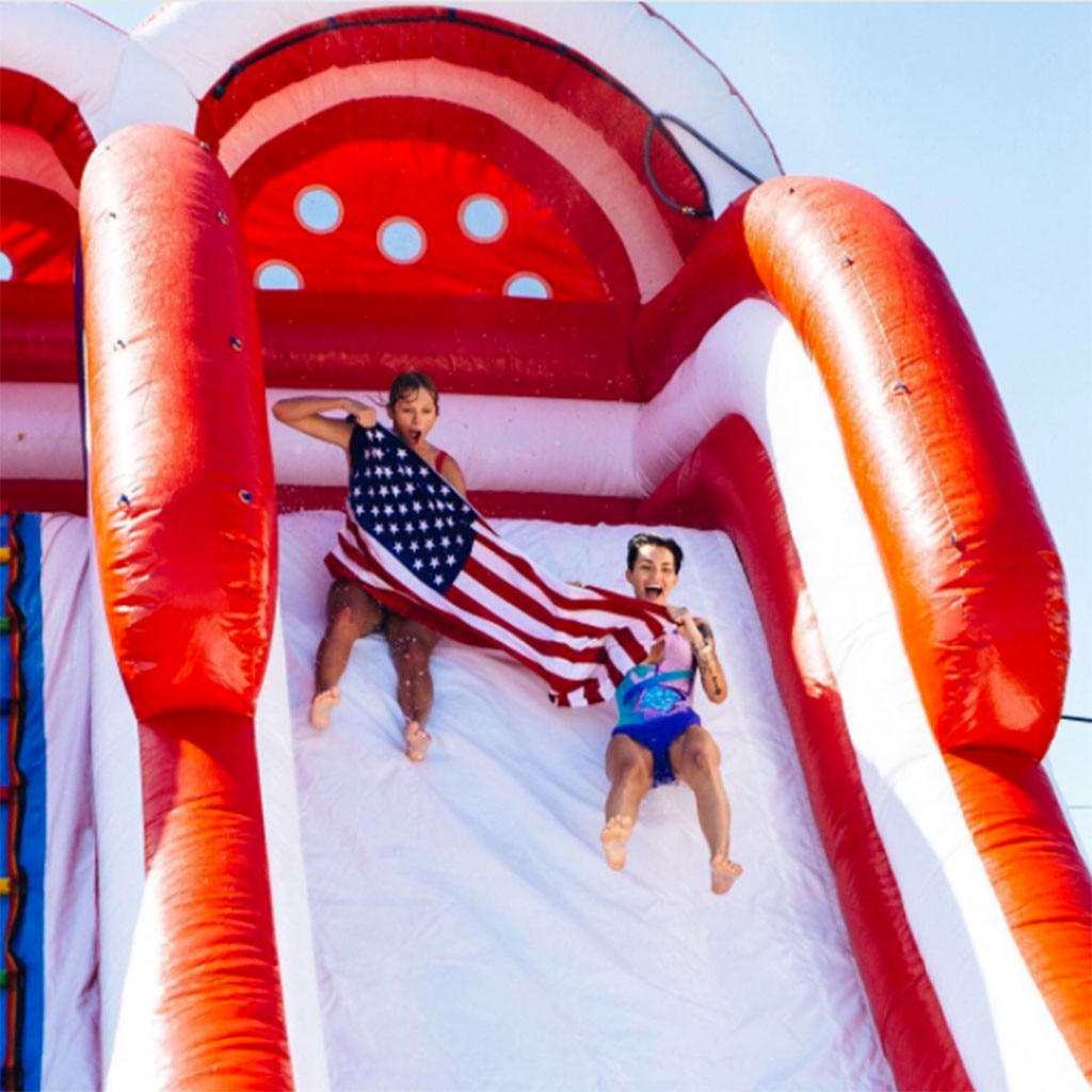 Taylor Swift And Ruby Rose From Stars Riding Giant Inflatable Pool Toys E News