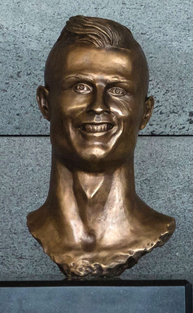 https://akns-images.eonline.com/eol_images/Entire_Site/2017229/rs_634x1024-170329085415-634.Cristiano-Ronaldo-statue.cm.32917.jpg?fit=inside%7C900:auto&output-quality=90%20