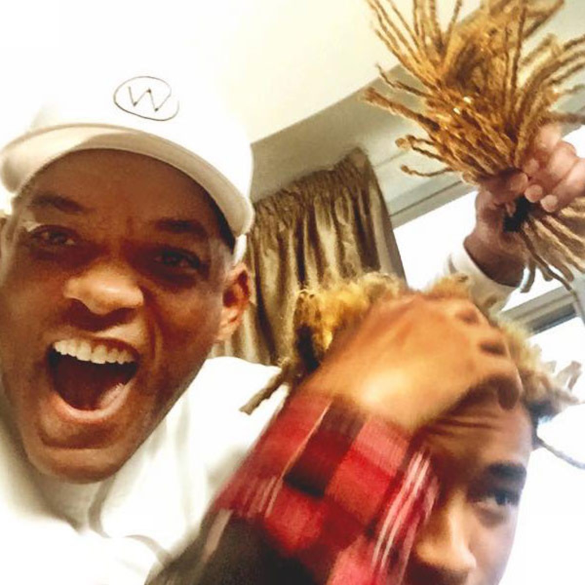 Will Smith Chops Off Jaden Smith's Hair and Tries It On - E! Online