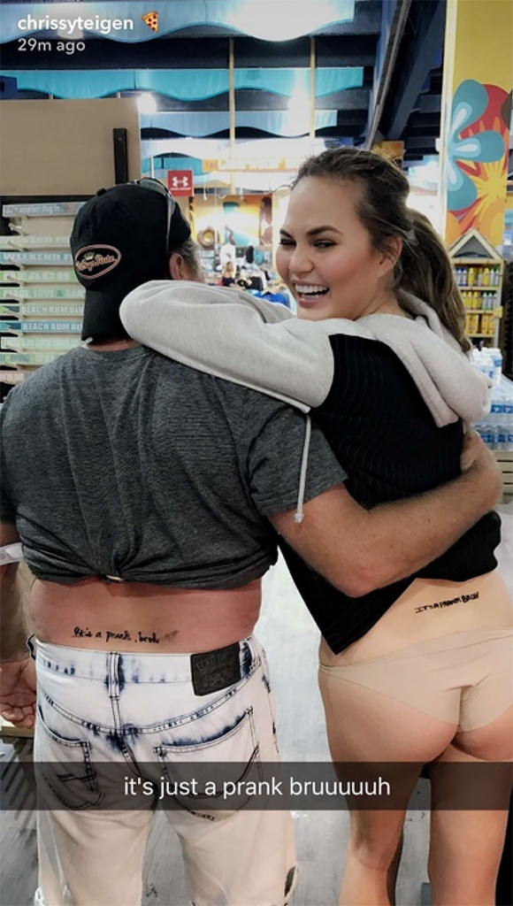 Chrissy Teigen Gets A Tramp Stamp Tattoo In Response To