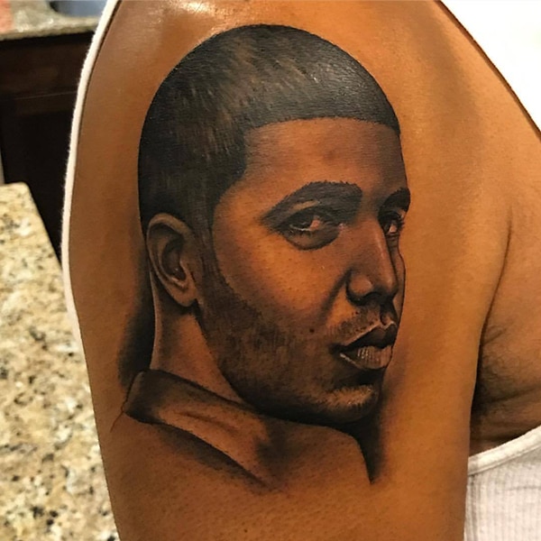 Drakes Father Dennis Graham Gets Tattoo of Son on His Arm  HipHopNMore