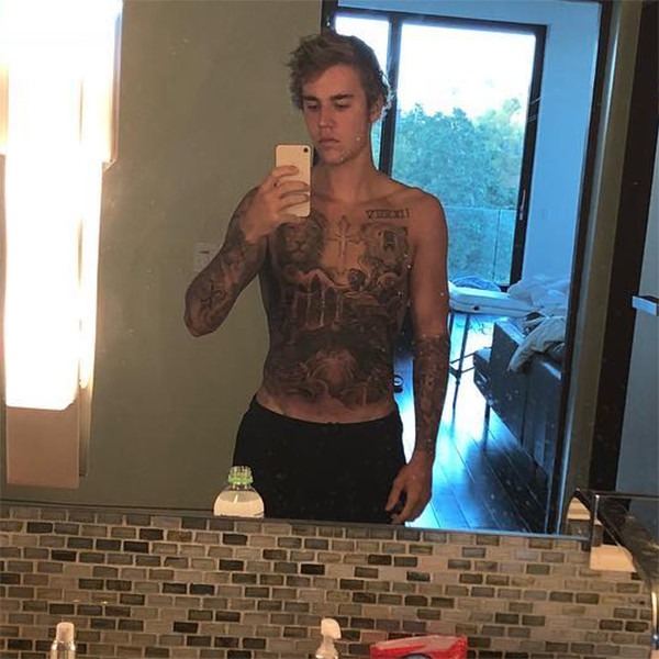 Justin Bieber Shows Off 100 Hours Of Tattoo Work In New Shirtless Selfie E News