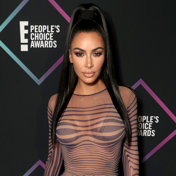 Kim Kardashian Just Wore a See-Through Dress Without a Bra Underneath