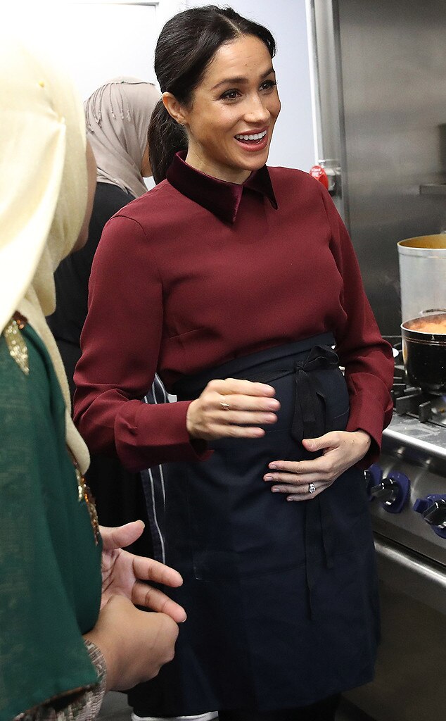 Meghan Markle Looks Radiant In Red At Hubb Community Kitchen Visit