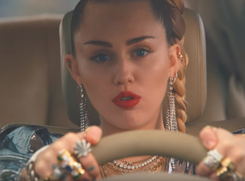 Miley Cyrus Takes Us On A Fiery Police Chase In Nothing Breaks Like A Heart Music Video E 