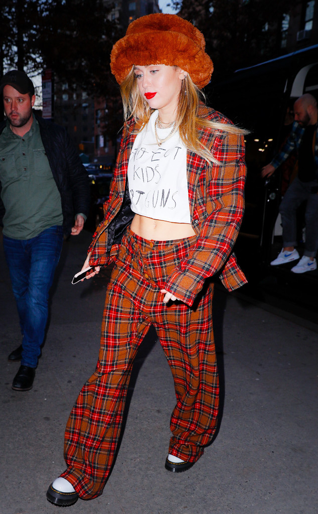 Photos from Miley Cyrus' Winter Wardrobe Is F-I-R-E