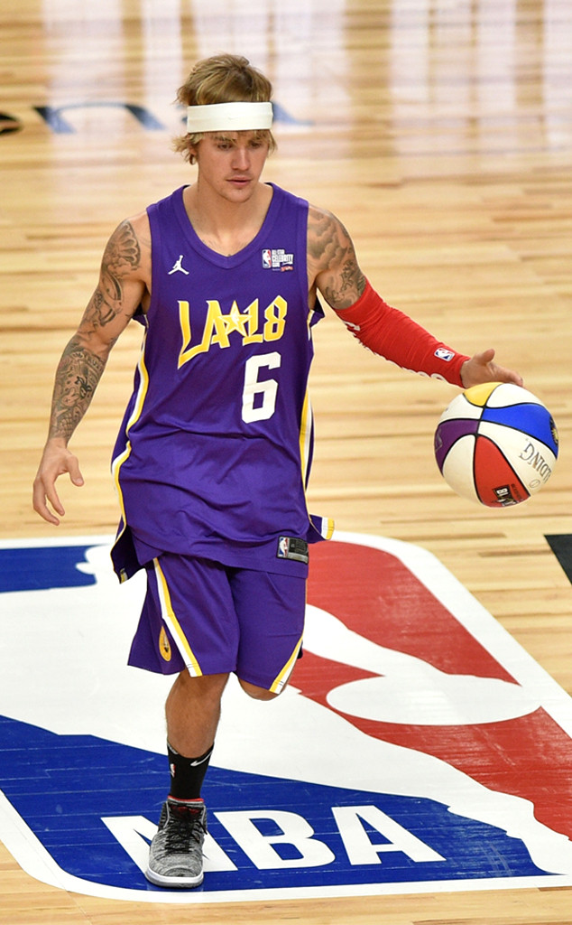 Justin Bieber at NBA All-Star Celebrity Game playing basketball in