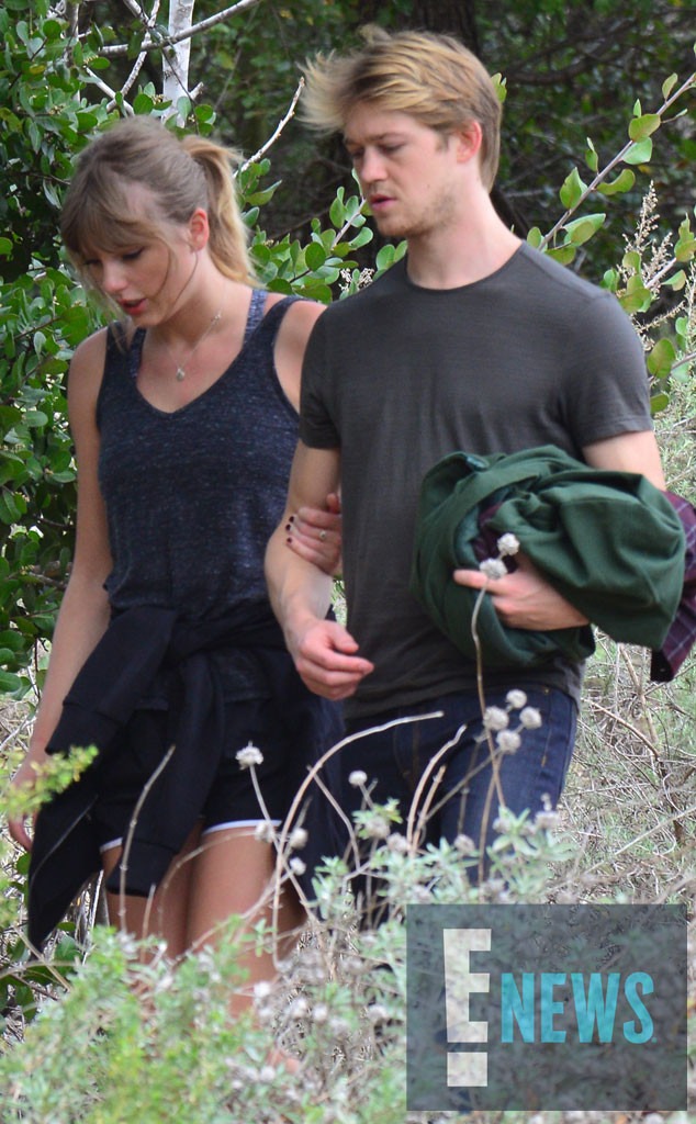 Taylor Swift Holds Joe Alwyn Close During Rare Outing In
