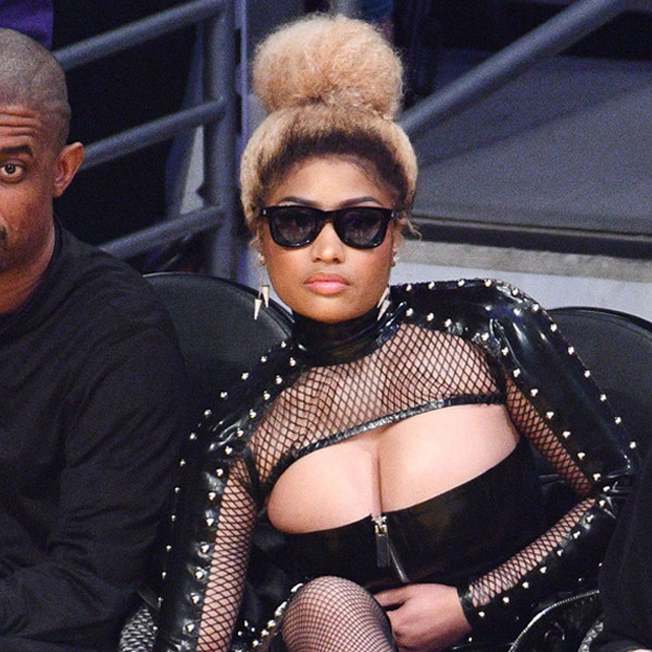 Nicki Minaj Stands Out From the Crowd in Bold Courtside Leather Look