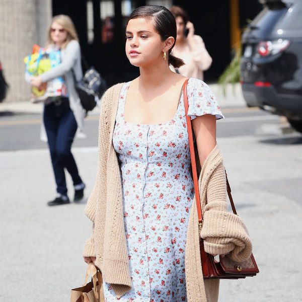 Selena Gomez Demonstrates How to Wear Sneakers With Your Fall Dress
