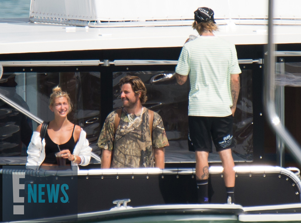 Justin Bieber and wife Hailey Baldwin lug huge Louis Vuitton gifts into a  boat party in Los Angeles