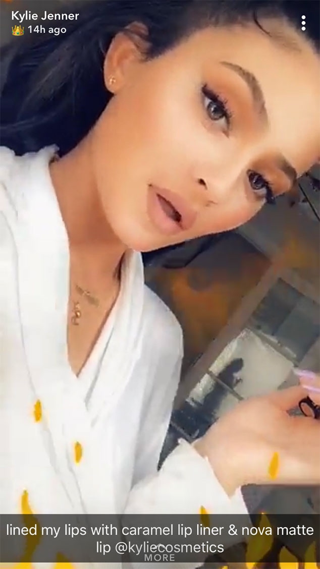 Kylie Jenner Plumps Up Her Lips Again With Lipstick E Online Kylie Jenner Plumps Up Her Lips Again With Lipstick E Online