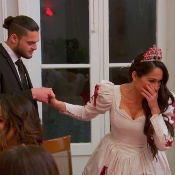 Watch Nikki Bella Get Swept Off Her Feet by Male Strippers in Paris