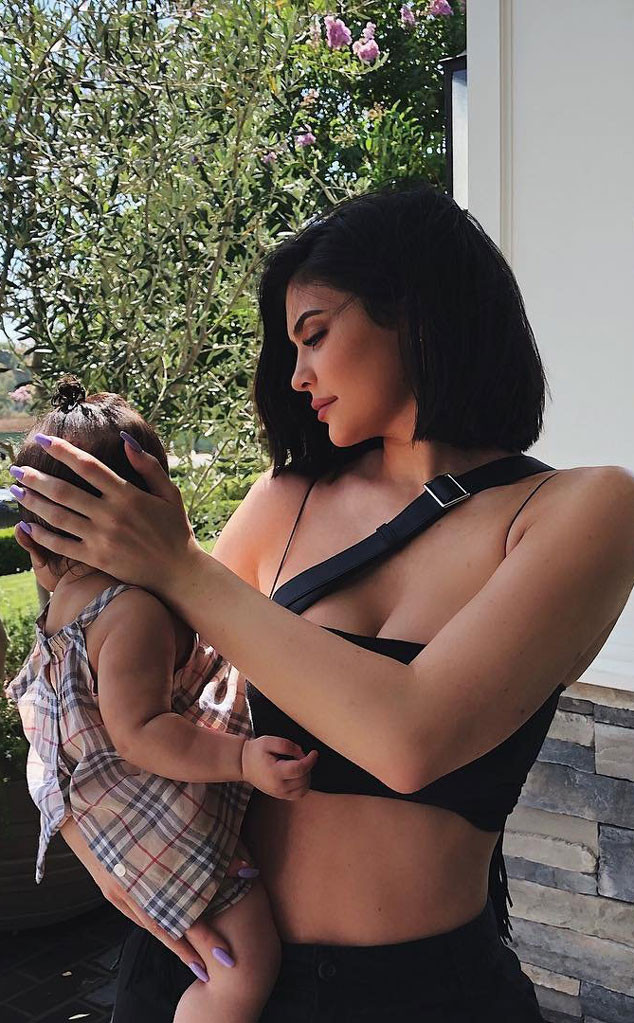 Kylie Jenner shows off thong underwear and flaunts her tiny waist