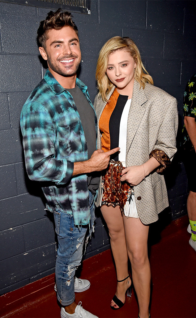 Chloe Grace Moretz stands out in a floral-print top at Louis