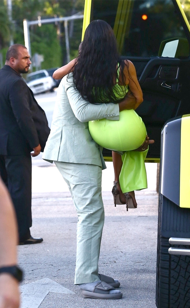 Kanye West Carries Kim Kardashian to the Car After Romantic Outing to 2  Chainz's Wedding