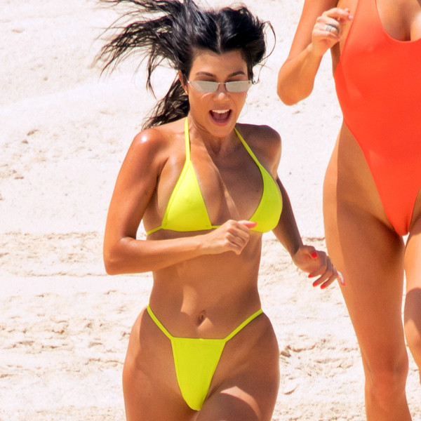 Hot Mama! See Kourtney Kardashian Work Out In a Thong Bikini