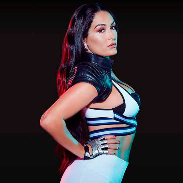 See Nikki Bella Flirt With a Younger Beau in New Supertease