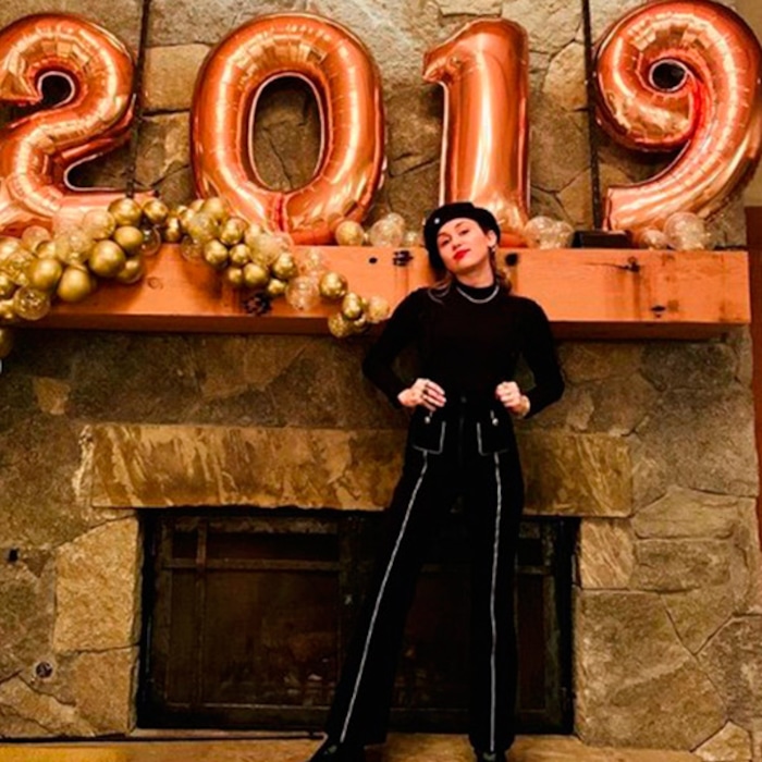 Miley Cyrus Celebrates New Year's Eve With Liam Hemsworth's Family - E! Online