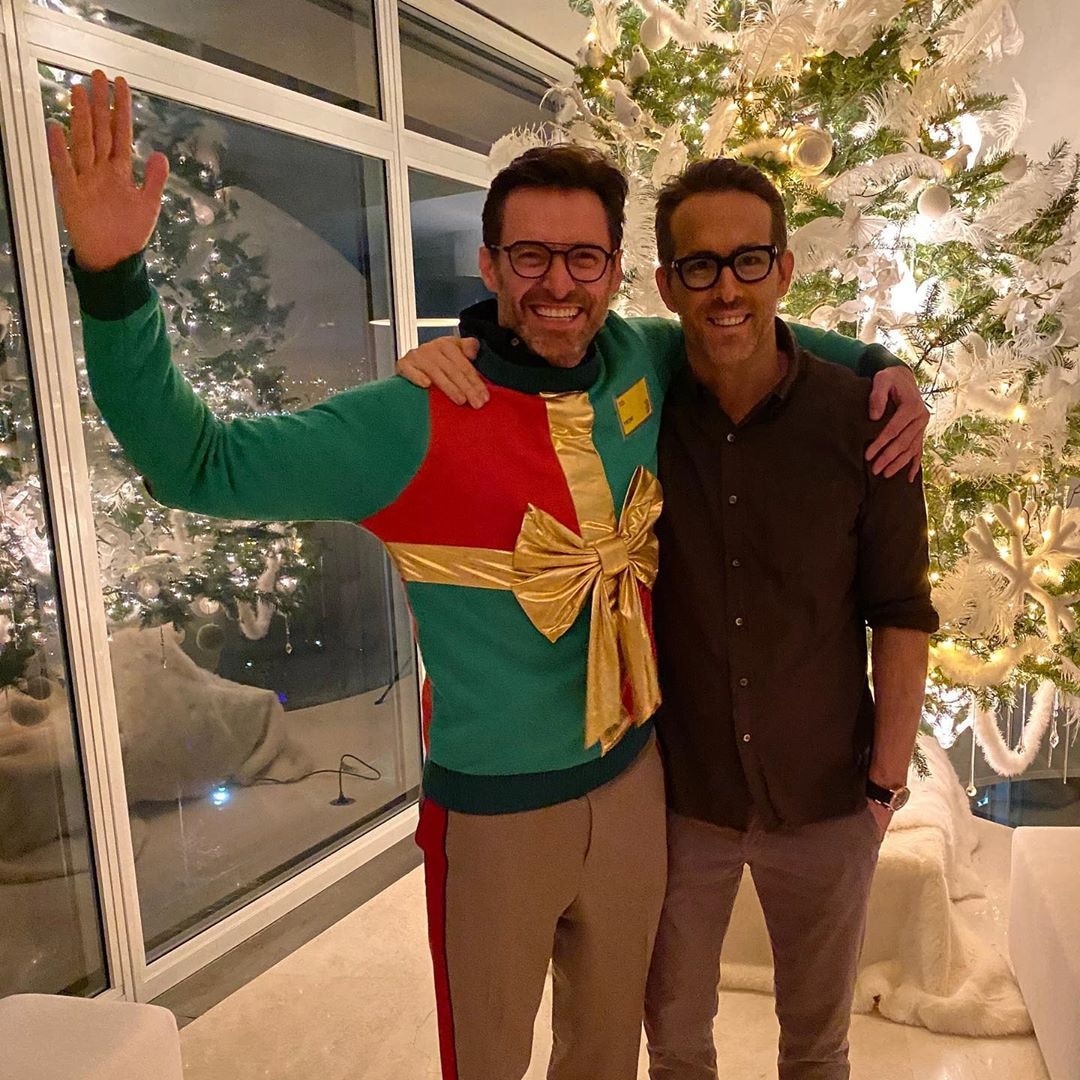 Hugh Jackman & Ryan Reynolds from Celebrities Celebrate the Holidays