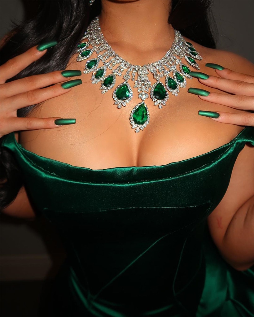 Kylie Jenner & Stormi Twin in Emerald at Kardashian X-Mas Party - E! Online