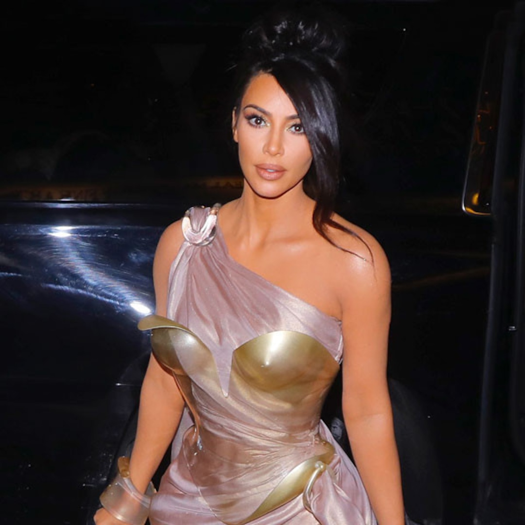 Kim Kardashian Is a Gold Gladiator at Thierry Mugler Exhibition Kim Kardashian Is a Gold Gladiator at Thierry Mugler Exhibition