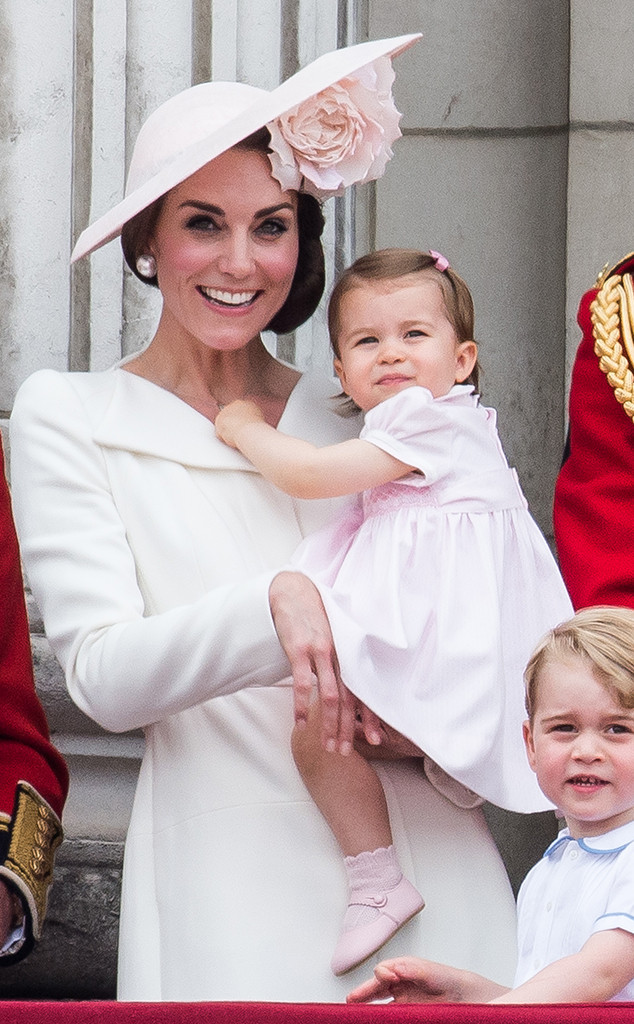 Meghan Markle smiles warmly at Princess Charlotte as the Royal
