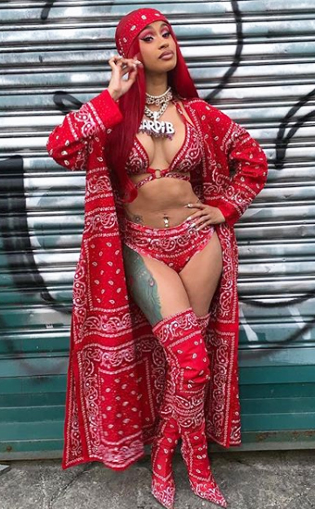 Cardi B's Corset, Thigh-High Stockings & Red Bottoms Are Bold for
