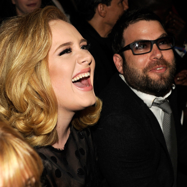 Adele shows off her pregnancy on a stroll with boyfriend in